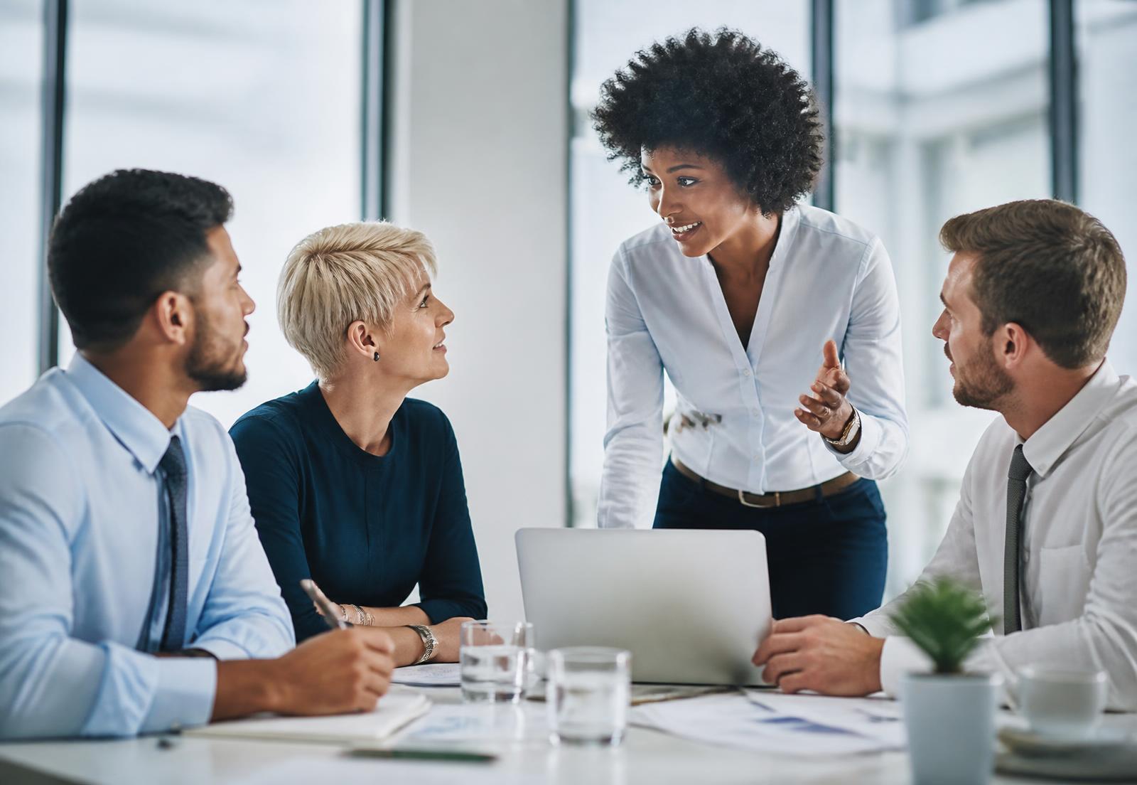 Recruiters and business professionals collaborating in a modern office